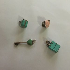4 authentic Tiffany and Co charms fair condition